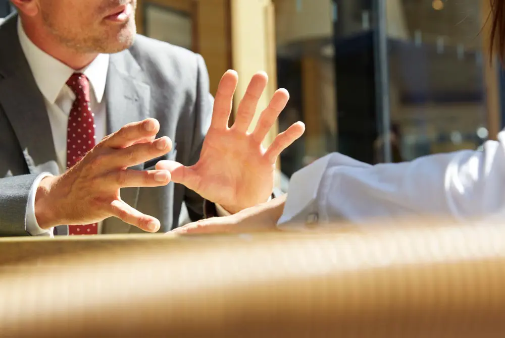 Lawyer gesturing during discussion